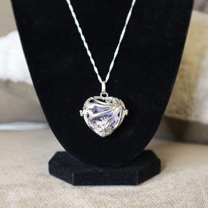 Beautiful Amethyst in a Heart-Caged Pendat